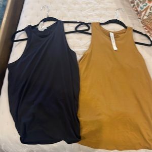 Lululemon tanks, open back that can be tied or left loose.